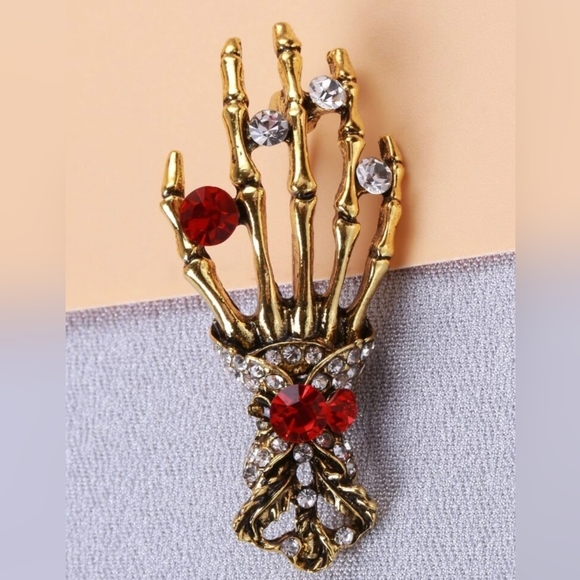 Gold plated red and white crystal skeleton hand necklace/brooch - Picture 3 of 11